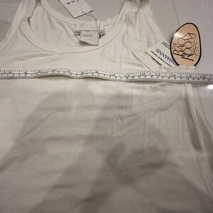 Brand new with tagsT shirt size 44 in italian in English is size 10